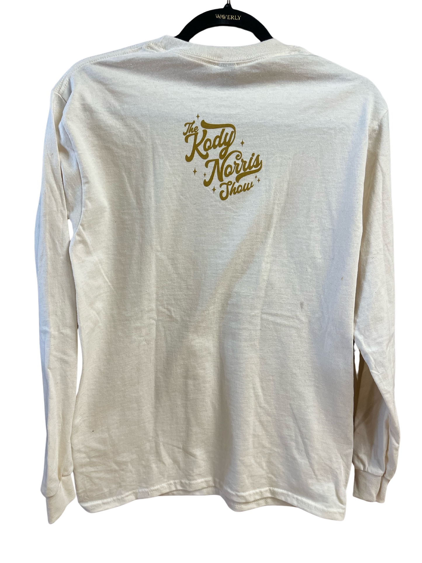 The Kody Norris Show Graphic Tee (Long Sleeve, Color Natural) Natural with Gold Lettering on the front and back Long Sleeve Gildan.