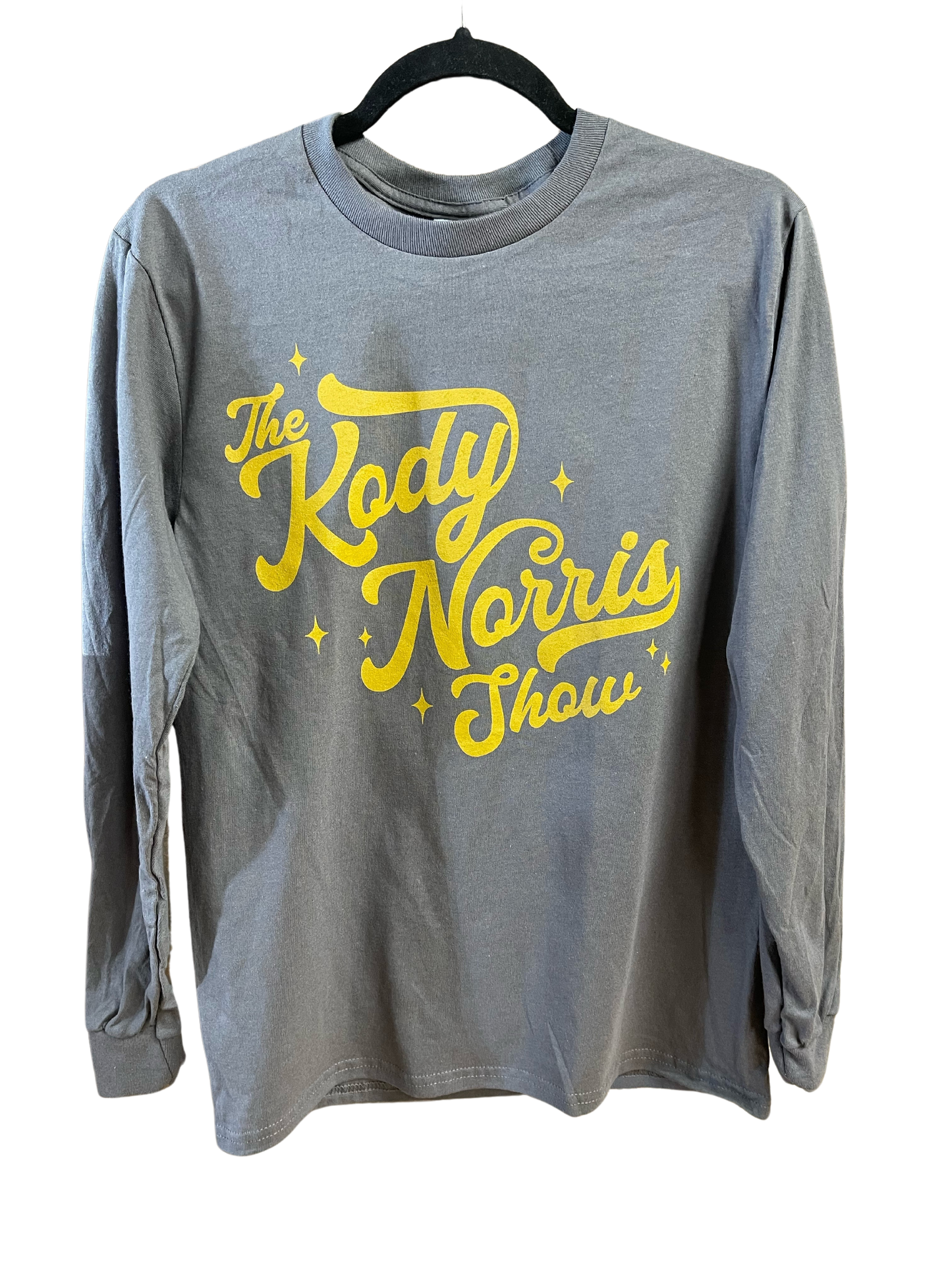 The Kody Norris Show Graphic Tee (Long Sleeve, Color Charcoal) Charcoal with Gold Lettering. Long Sleeve Gildan.